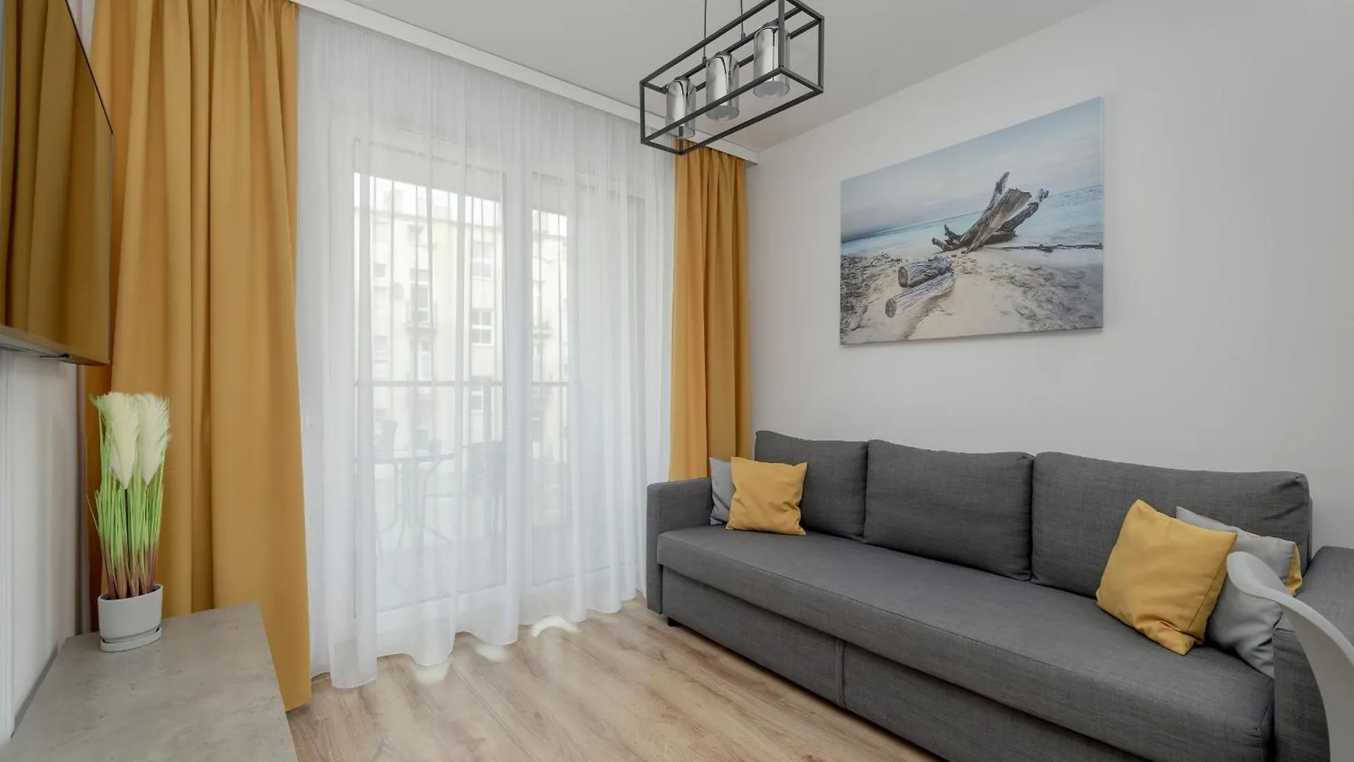 Exclusive And Modern Grey Apartment With Furnished Balcony In Kolobrzeg By Noclegi Renters